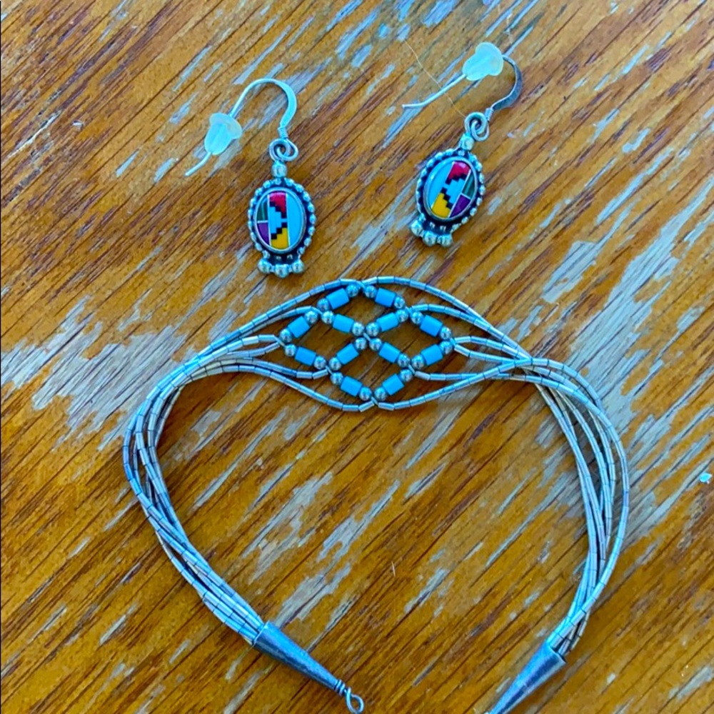 turquoise and silver earrings and bracelet